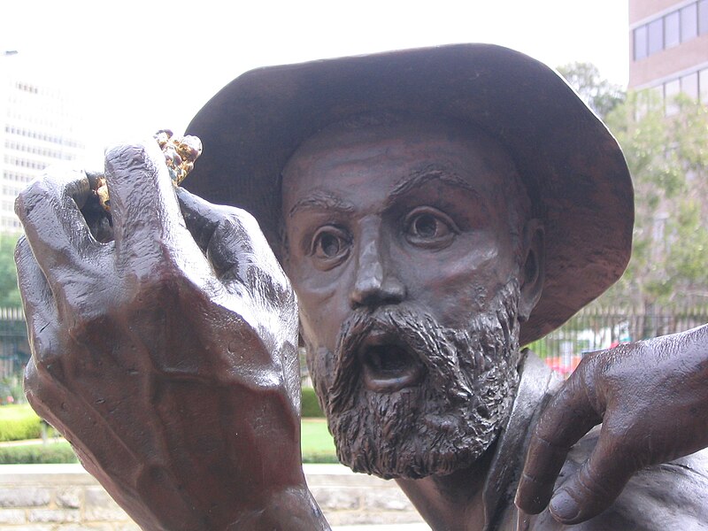 William Ford holding Gold Nugget - The Strike Statue by Greg James